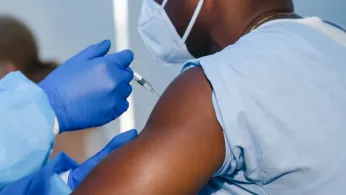 person receiving the COVID-19 vaccine